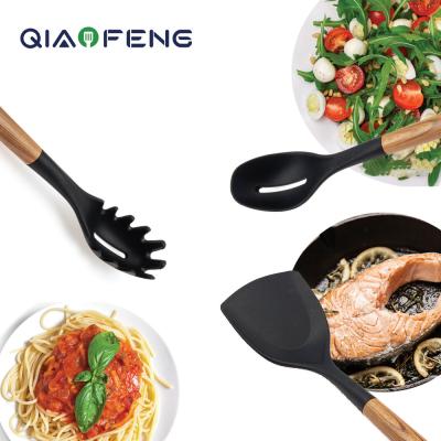 China Sustainable Kitchen Accessories 8PCS Non-slip Heat Resistant Nylon Utensils With Wooden Handle for sale