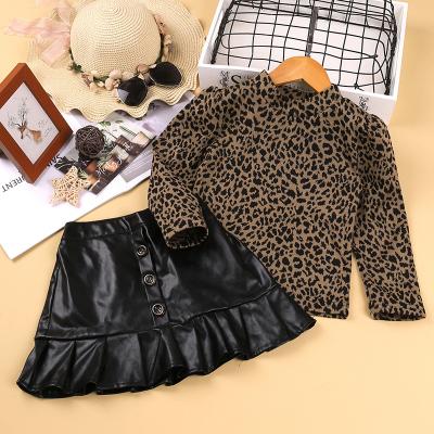 China New Style Children's Clothing Preppy Fall Costume Leopard Long Sleeve Based Leather Skirt 2pcs Set Baby Clothes for sale