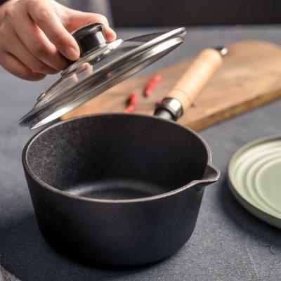 China Modern Uncoated Non-stick Milk Pan Cast Iron Saucepan With Lid Melt Milk Saucepan for sale