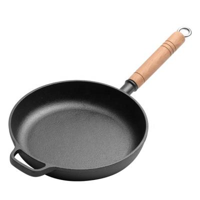 China Sustainable 28 Cm Pre-Seasoned Cast Iron Skillet With Wooden Handle Round Non-Stick Cast Iron Skillet for sale