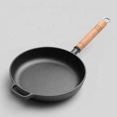 China Durable Stove Oven Cookware Round Cast Iron Pre-Seasoned Stove With Wood Handle for sale