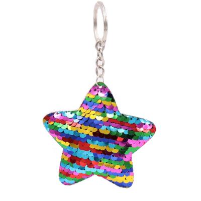 China Soft Hand Feeling Fan Shu Reflective Key Chain Party Favors Christmas Tree Decoration Star Sequin Key Chain for sale