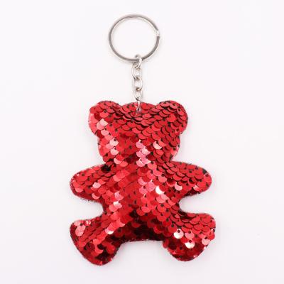 China Soft Hand Feeling Fan Shu New Design Cute Animal Shape Reversible Colorful Bling Sequin Key Chain Pendant for sale