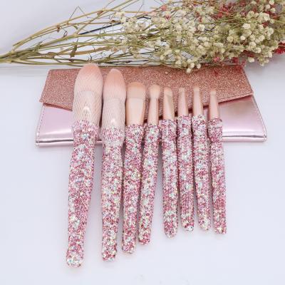 China Soft Stiffens Luxurious 8 Pcs Bling Makeup Brush Set Women's Hand Make Hign Grade Rhinestone Purple Gold Color Eyebrow Face Makeup Brush Set for sale