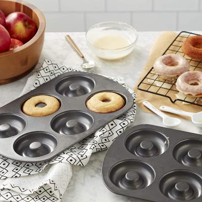 China Custom Shape Non-Stick Metal 6-Cavity Cast Iron Donut Molds Viable With Non-Stick Coating for sale