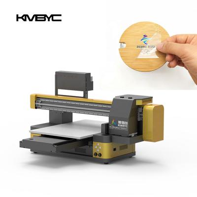 China Metal Crystal Sticker Color and Varnish Machine Printer 6090 Dual Rail 3 Heads KMBYC for sale