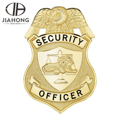 China Promotional Cheap Custom 3D Logo Metal Security Antique Goden Ribbon Badge for sale