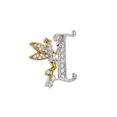 China Crystal Wholesale Customizable Logo Elf Eye Letter Angel Brooch With White Rhinestone Alphabet Brooches for sale