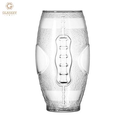 China Modern Shaped Glass Beer Mug American Football Rugby Team Glass Custom Logo Beer Bottle Glass for sale