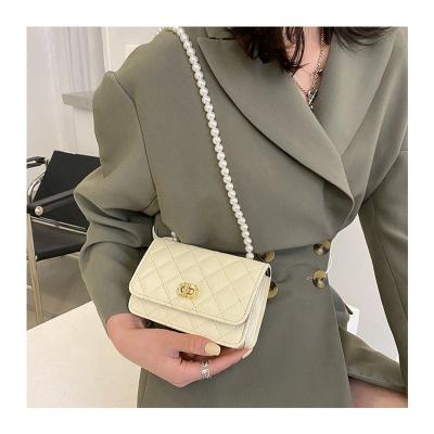 China Pearl chain ladies fashion leather shoulder bags luxury women sell well new type pearl chain sling shoulder bag for sale