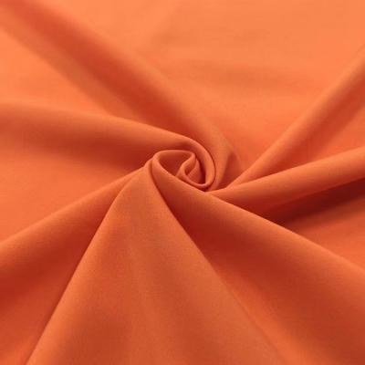 China Waterproof Hot Spot For Sportswear 4 Way Stretch Fabric Plain 100% Polyester Fabric for sale