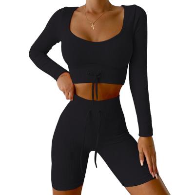 China Breathable Women Slim Drawstring Seamless Comfortable Round Two Piece Set Solid Color Yoga Suit Neck Shorts Pants for sale