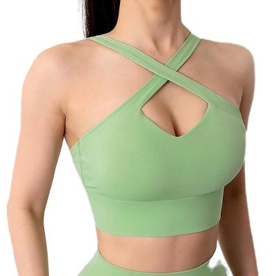 China 6474100 Breathable Cross Strap Deep V Neckline Hollow Out Support Impact Fitness Yoga Sports Bra Sleeveless Crop Top for sale