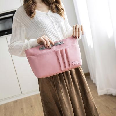 China Wholesale Insert Women Organizer Bag Factory Factory Makeup Cosmetic Bags Travel Organizer Pockets Handbag for sale