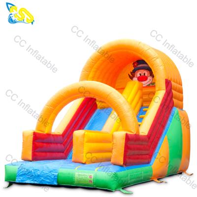 China Commercial PVC Clown Inflatables Double Side Slides Bounce Bouncy House Inflatable Castle Slide for sale