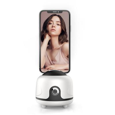 China Ready To Board Auto Selfie Topjoy 360 Rotation Smart Selfie Face Object Tracking Shooting Camera Mobile Phone Holder for sale