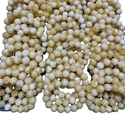 China Exquisite White Amber Islamic Amber Beads String Hand Beads Russia Tiger Pattern High End Wholesale Natural Religious Skin Amber for sale