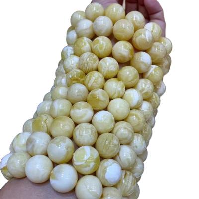 China Religious Wholesale Natural Amber Beads Hand String Baltic White Amber Tiger Skin Grain Amber Loose Beads for sale