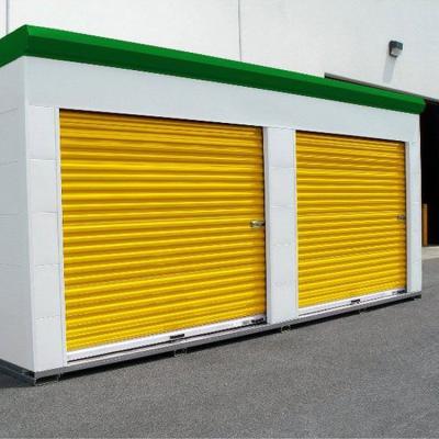 China Modern Custom 12 By 12 Store Pulley Backing Manual Roll Up Garage Doors for sale