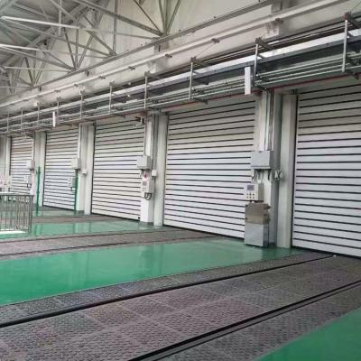 China Modern Exterior Inductive High Speed ​​Aluminum Rigid Metal Spiral Hard Rapid Door en venta