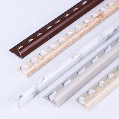 China Modern Ceramic Marble Tile Corner Protector With Round Hole Tile PVC Bullnose Punch Ledge Strip For Middle East Market for sale