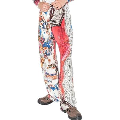 China Anti-wrinkle OEM custom design color wide-leg pants abstract printing fashionable casual pants for men for sale