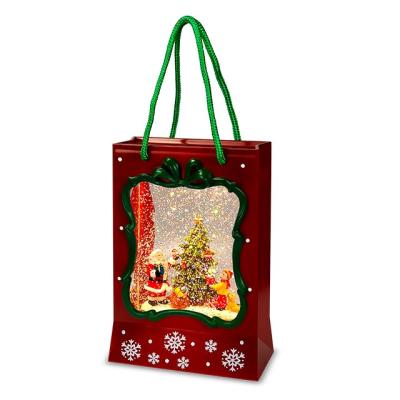 China Factory Price Resin Led Gift Bag Lantern Decoration Gift Ornaments Santa Claus Christmas Snowball Lantern for sale