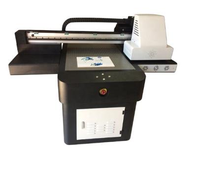 China New Design 9060 Flatbed UV Printer Home Use With High Speed ​​UV Flatbed Printer for sale