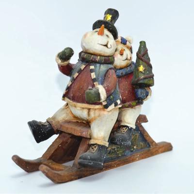 China Hand Made Europe Crafts Resin Christmas Snowman Statue With Sleigh for sale