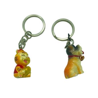 China Hand carve animal shape key chain cheap custom keychains 3d keychains for sale