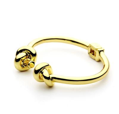 China Fashion Jewelry Stainless Steel Knot Hinged Cuff Bracelet Environmentally Friendly Polished Bangle for sale