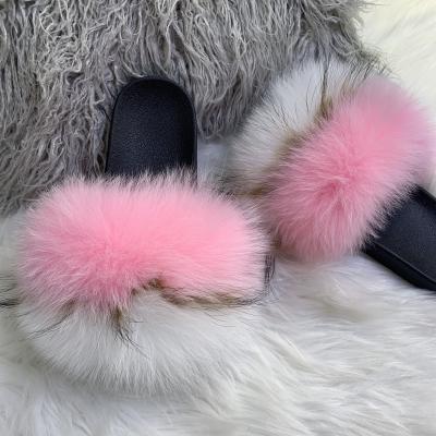 China 2021 Fashion Trend Hot Selling Raccoon Fox Fur Hairy Slides Big Real Fashion Women's Slippers Soft Sandals For Women for sale