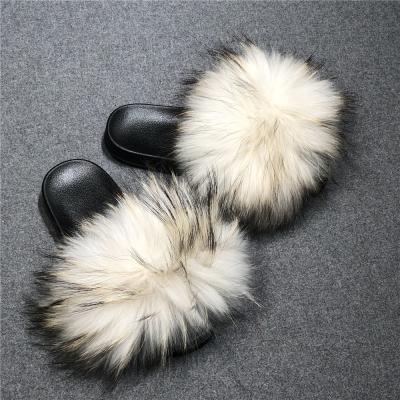 China Hot Selling Soft Puffy Outdoor Lady Fashion Trend Ins Real Fur Slider Raccoon Slider Slipper Shoes For Women for sale