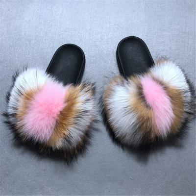 China Outdoor Slippers Wholesale Extra Fluffy Fox Raccoon Fur Slippers Full Cover Big Fur Slides Woman Custom Slippers For Women for sale