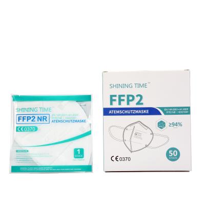 China Earloop guaranteed quality ffp2 dust face mask ffp2 disposable face mask nonwoven fabric in German warehouse stock for sale