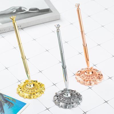 China Diamond Table Stand Swivel Ball Pen Hotel Reception Rose Gold Silver Table Ball Pen for sale