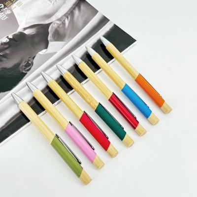 China Environmental Multi Color Press Type Bamboo Ball Pen Printing Logo Click Ballpoint Pen for sale