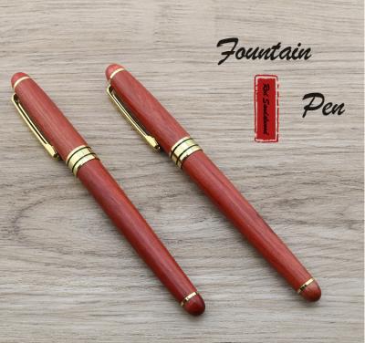 China Rosewood Fountain Pen With Custom Logo Hand Polishing Wooden Craft Pen Business Gift for sale