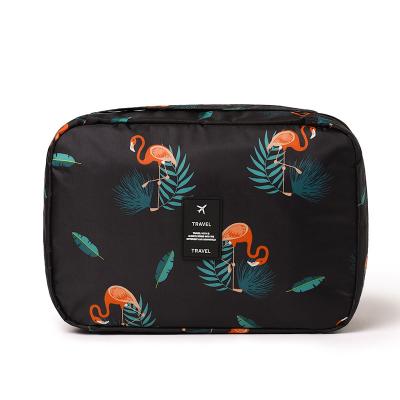 China Portable Fashion Flamingo Design Travel Twill Fabric Toiletry Bag Promotional Travel Make Up Cosmetic Bag With Hook for sale