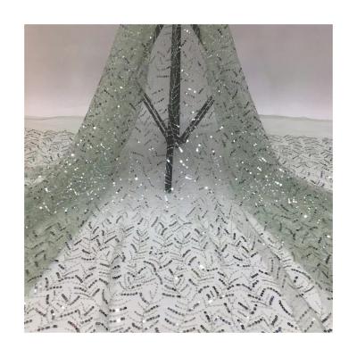 China Who respects the environment; viable new wedding dress fabric sprinkling lace silver sequin powder mesh gauze beaded lace fabric for sale