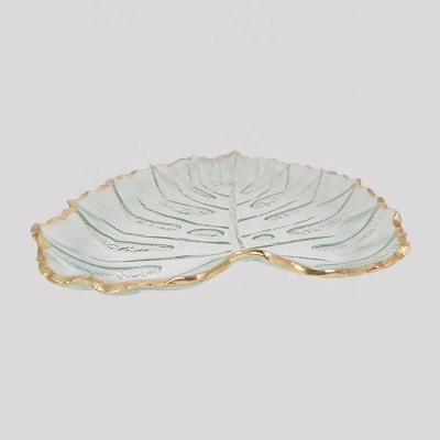 China Sustainable Customized Gold Edge Glaze Cabbage Sheet Shaped Glass Charger Dishes for sale