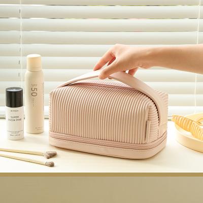 China New Durable 2023 Toast Cream Cosmetic Bag Female Large Capacity Lipstick Storage Portable Bag for sale