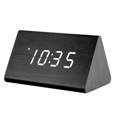 China Triangle Modern Wooden Electronic Alarm Clock LED Digital Pendulum Electric Clock Creative Wooden Alarm for sale