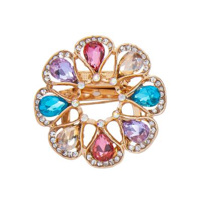 China Trendy Colorful Crystal Gemstone Flower Brooches Women Jewelry Flower Brooch Hijab Pin Rhinestone Crystal Geometric Round Fashion for sale