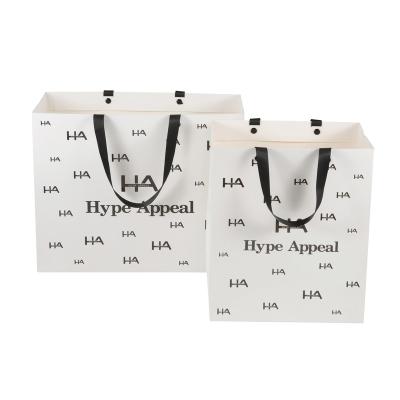 China Famous Recycled Materials Luxury Branded Recycled Beautiful Customized White Letter Paper Bag With Logo for sale