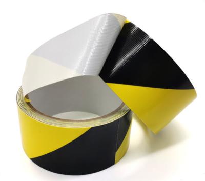 China Manufacturer Waterproof Cloth Tape , Easy To Tear Black And Yellow Single Sided Non-residual Adhesive Cloth Warning Tape for sale