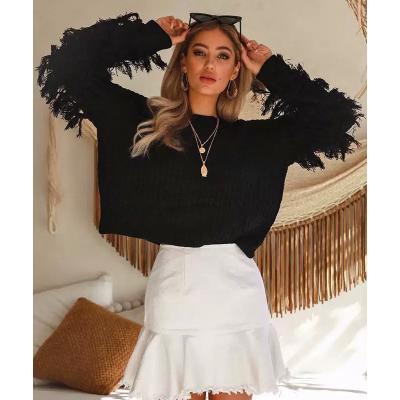 China Anti-wrinkle spring fashion women sweaters solid fringe long sleeve ladies knitted loose sweater tassel pullover for sale