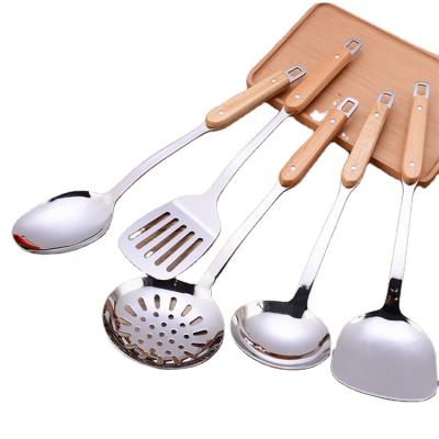 China Sustainable Hot Sale Kitchen Tools Wooden Handle Utensils Cooking Accessories Stainless Steel Cookware Sets for sale