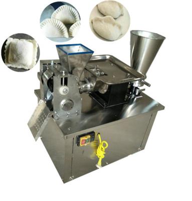 China Low Energy High Speed ​​Desktop Small Electric Dumpling Making Machine Vending Belt Wrench Motor Wrapping Food Dimensions Technical Sales Video for sale