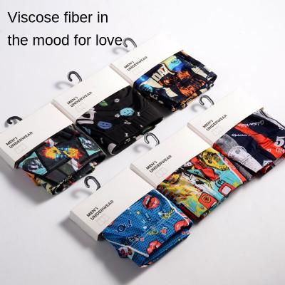 China Antibacterial Ice Silk Fashionable Printed Men's Boxers Summer Stain Mid Waist Youth Breathable Boxer Card Pack Single for sale